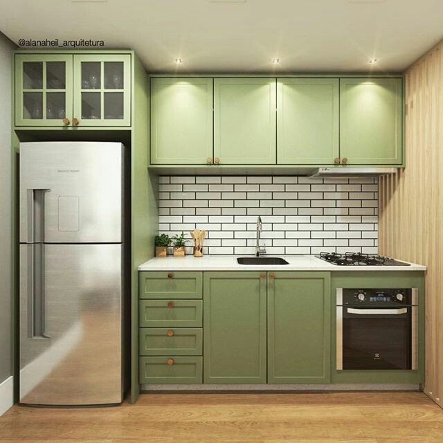 Untuk anda yang mempunyai lahan sempit, kitchen set minimalis yang satu ini sangat cocok. Selain memiliki warna menarik, yaitu hijau, kitchen set ini juga mempunyai banyak lemari yang sangat berguna. Lalu adanya lemari dengan kaca pada bagian atas kulkas membuat penampilan dapur lebih cantik