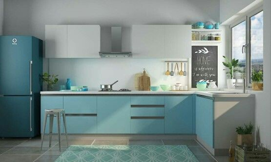 Selain warna hijau yang menarik, warna biru juga tidak jarang dipilih untuk diaplikasikan pada dapur. Kitchen set minimalis dengan perpaduan warna biru dan putih ini terlihat semakin menarik dan cantik dengan adanya aksen abu-abu pada beberapa bagian lemari