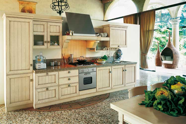 Nuansa hangat dari kitchen set minimalis dengan aksen kayu