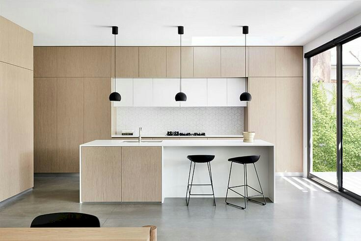 Jika anda ingin memanfaatkan lahan rumah anda, anda bisa mencontoh desain kitchen set minimalis di bawah ini. Kitchen set dengan aksen kayu yang menarik ini memanfaatkan luas dinding sebagai lemari untuk tempat menyimpan peralatan memasak. Lalu agar semakin unik, di tengah-tengah diberi ruang untuk tempat kompor
