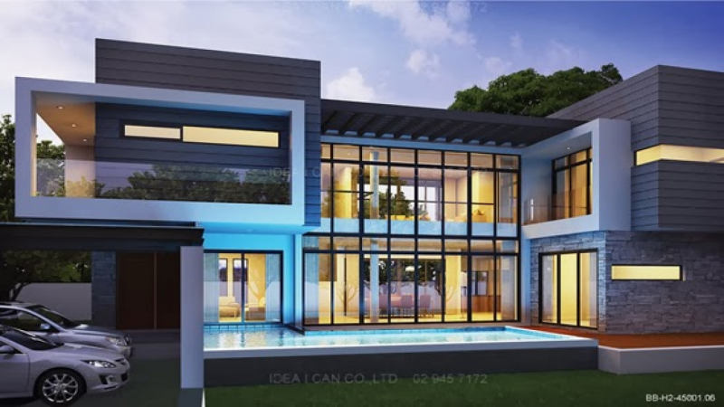 12. Desain rumah dengan perpaduan batu alam dan kayu serta balkon yang luas