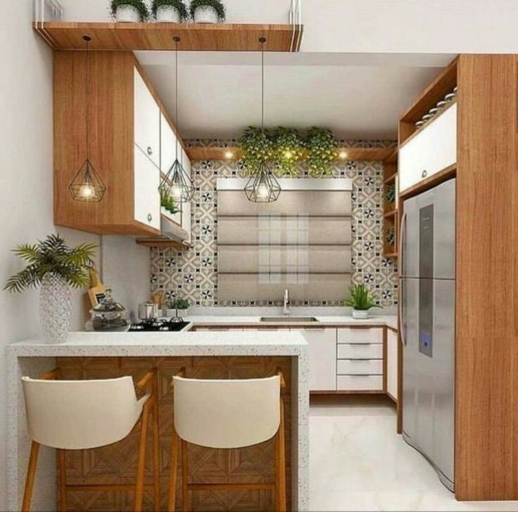 Tambahkan lemari pada bagian atas dapur untuk memperbanyak tempat penyimpanan peralatan memasak. Dan jadikan dinding dapur sebagai sarana untuk hiasan dengan memberi corak pada wallpaper atau ubin agar terlihat indah