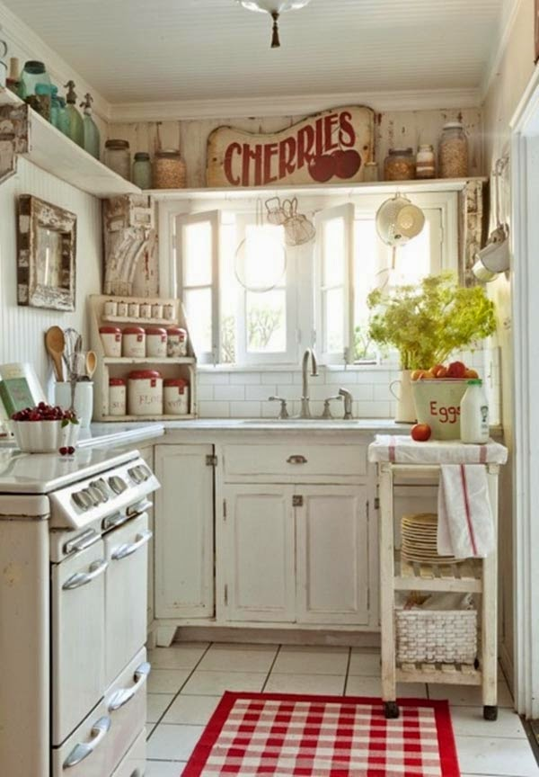 Jika anda kekurangan tempat untuk menaruh bumbu atau peralatan memasak. Anda harus bisa menyiasatinya dengan memanfaatkan area atas dapur dengan membuat rak kayu dengan warna senada. Berikan sedikit semburat warna merah untuk mempercantik dapur