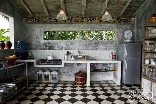 Untuk anda yang ingin dapur terbuka dengan kesan pedesaan, bisa memilih dinding yang finishing seperti di bawah ini tanpa kitchen set dan hanya meja sederhana dengan rak kayu pada bagian kanan