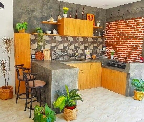 Untuk menghemat budget, anda bisa membuat meja dapur anda sendiri dengan bahan batu bata dan semen seperti di bawah ini. Tinggal menambahkan lemari untuk tempat penyimpanan, dapur anda sudah tampak cantik