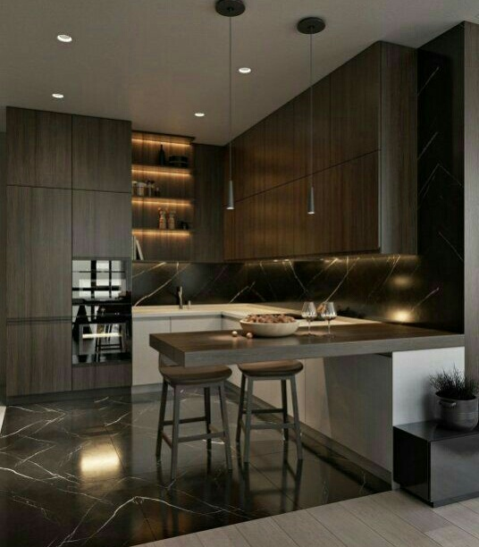 Perpaduan material kayu dengan bebatuan alam memang salah satu kombinasi untuk memperoleh dapur mewah. Dengan material tersebut anda pun hanya butuh kitchen set dengan desain yang simpel namun manis