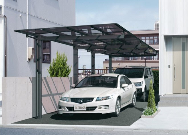 Desain teras garasi mobil dengan pot bunga