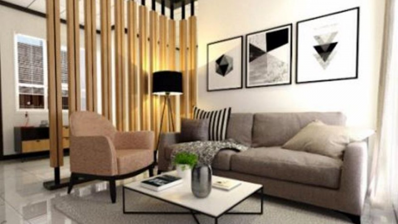 Desain rumah 10 x 10 m dengan Penggunaan sekat yang unik untuk ruang tamu