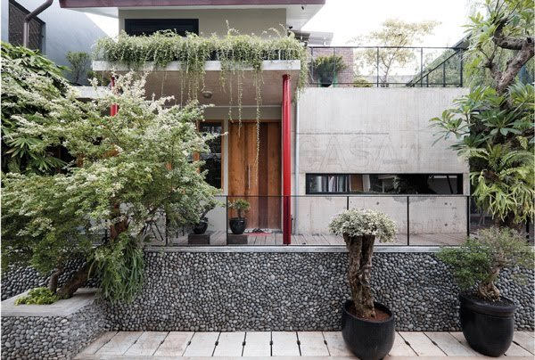 Desain Rumah 2 Lantai Minimalis dengan mengkombinasikan rumah dengan material yang sederhana