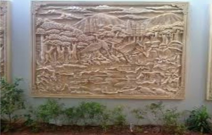 Desain Rumah 2 Lantai Dengan Ukiran Pada dinding