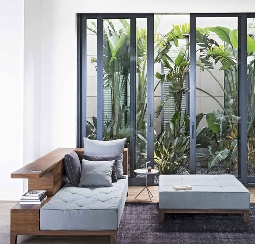 Desain Ruang Kebun di Ruang Keluarga Bernuansa Hijau