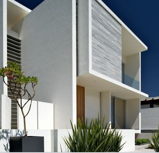 Desain rumah kost minimalis dengan nuansa putih