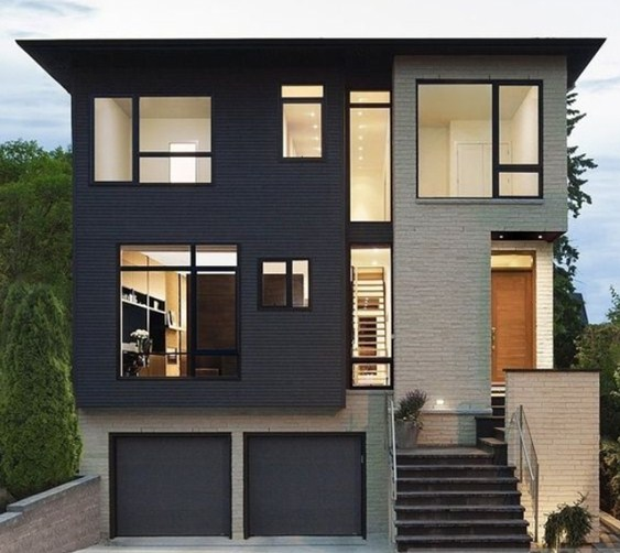 Tampilan rumah kost dengan kombinasi dari bata alami dan kayu