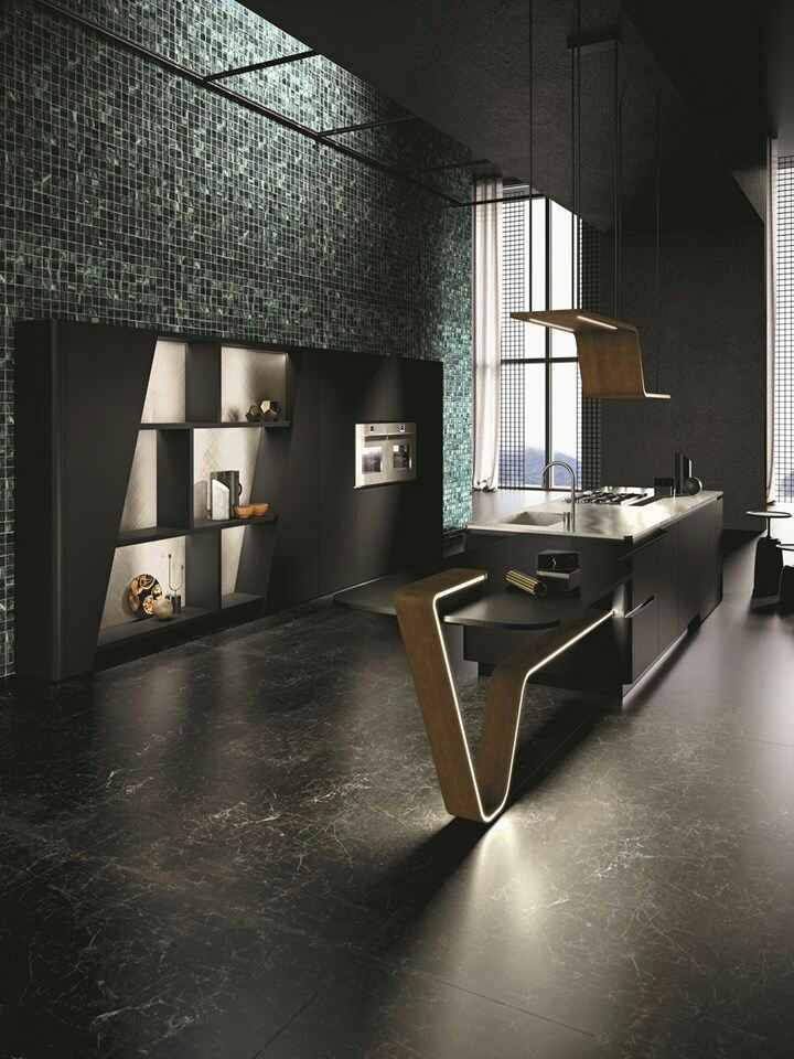 Sleek namun elegan dan unik adalah kesan yang bisa ditemukan dari dapur di bawah ini. Dengan dapur meja rangka lampu berbentuk futuristik modern, tema monokrom pada dapur terlihat menjadi lebih berbeda dan hidup