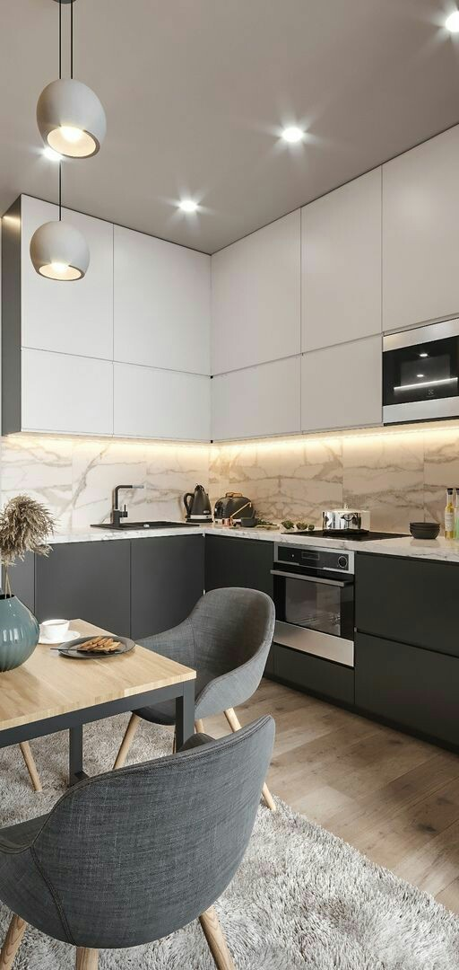 Kitchen set polos tanpa gagang laci seperti di bawah ini juga bisa anda taruh di dapur. Dikombinasikan dengan meja kayu dan kursi cantik, anda sudah bisa mendapatkan dapur minimalis yang modern