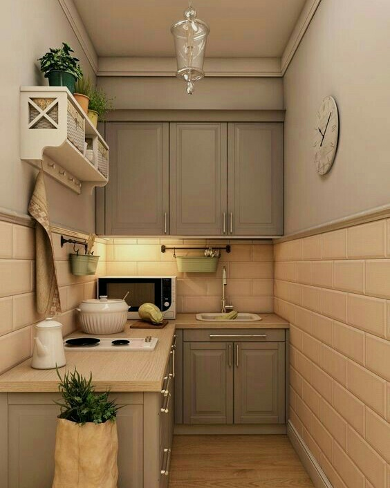 Selain warna warm tone, warna cool tone juga cocok untuk dapur kecil 2x2 anda. Dengan kombinasi cool tone pada kitchen set dan warm tone pada countertop juga sebagian area dinding, penampilan dapur menjadi lebih imbang